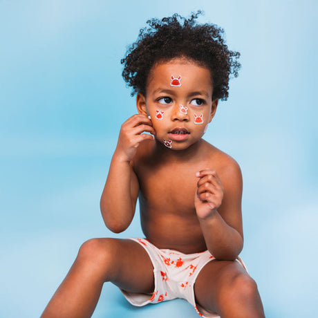 Crabby | beige red UV swimming boxer boys